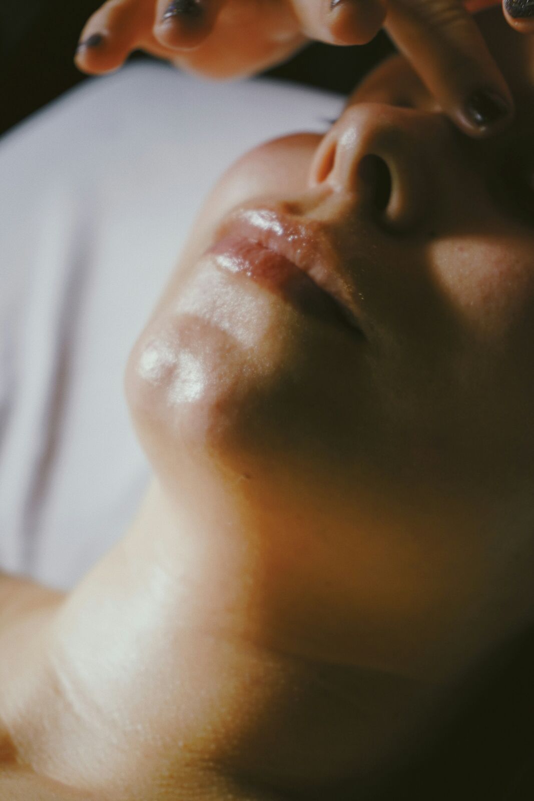 A face in warm golden light